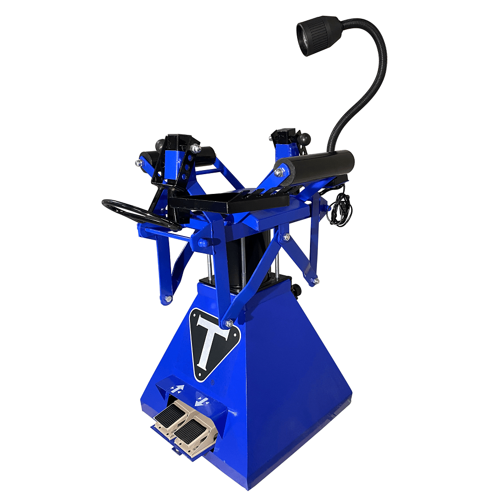 TRIUMPH TS-850 blue tire spreader with raised arms and attached work light