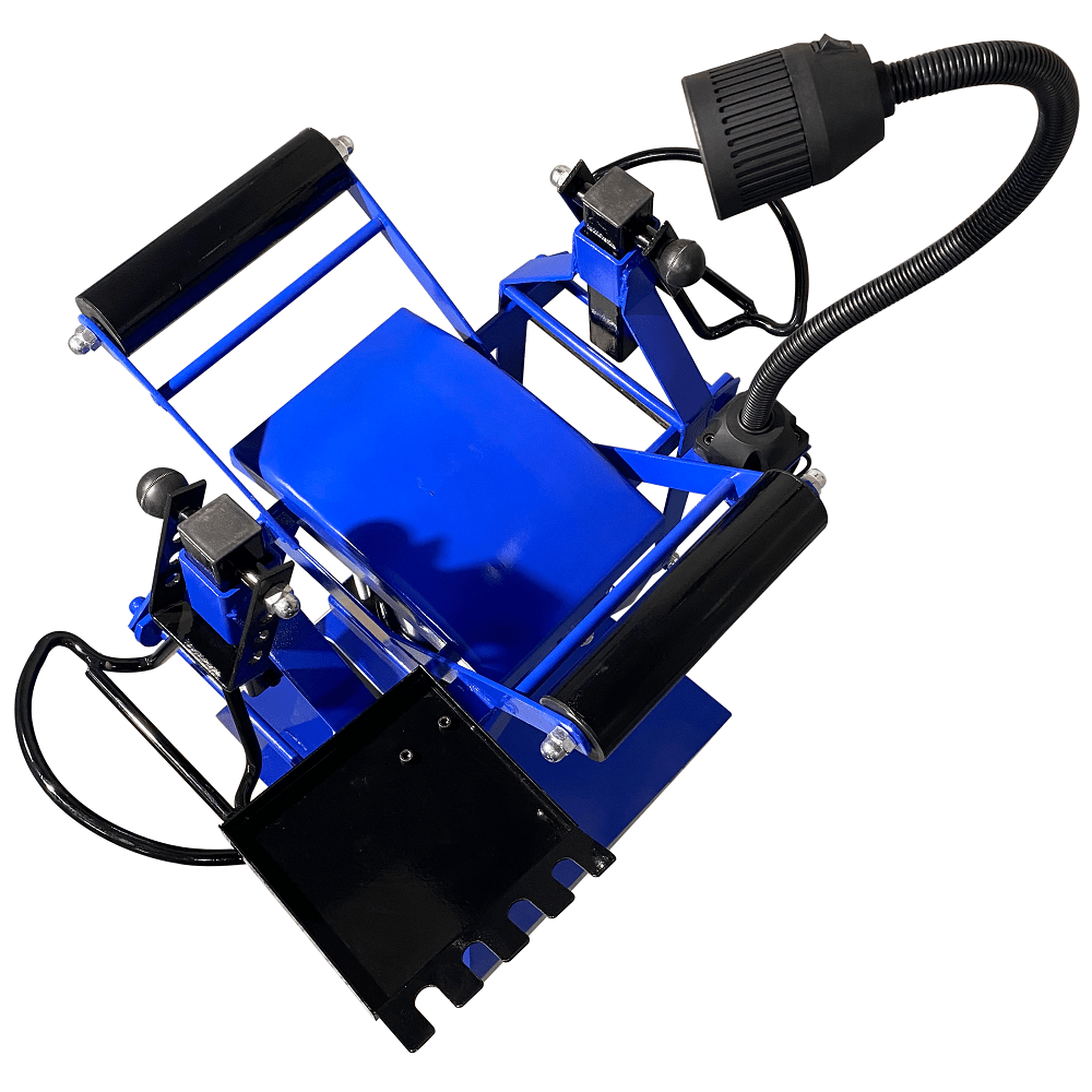 TRIUMPH TS-850 angled top-down view of blue tire spreader with attached wiring and pedal.
