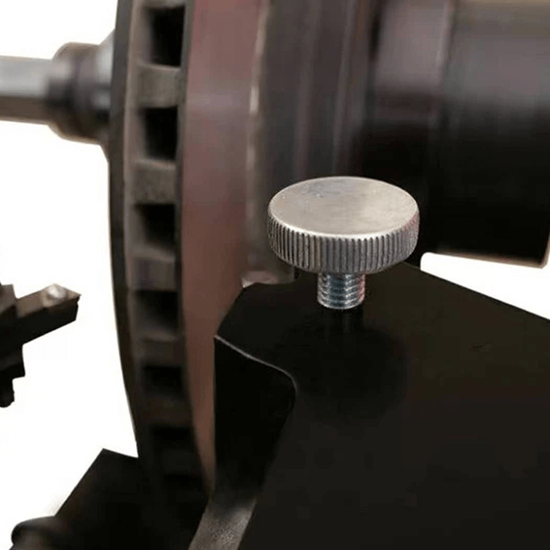 Close-up of Katool C9372 brake lathe tool engaging with a brake rotor surface during machining