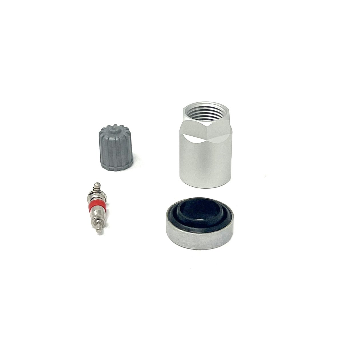 MT-RSR TPS-6139 components on white, valve core, gray cap, metal nut, and black grommet arranged.