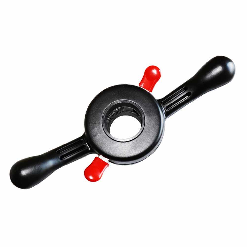 black wing nut with two handles and red locking pin shown on white background.