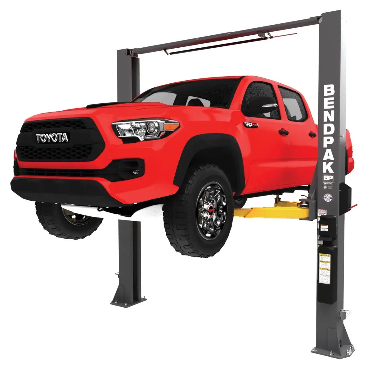 BendPak 10AP two-post lift raising a red Toyota truck; front three-quarter hero view shows columns, swing arms, overhead bar and power unit on white.