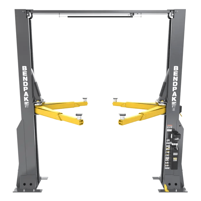 BendPak 16AP two-post lift, front view showing clearfloor design with gray columns, yellow drop-end arms, top beam, and right-side control panel