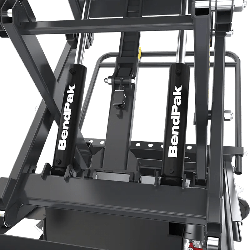 BendPak EVS3000 battery pack lift table closeup showing dual BendPak-branded hydraulic cylinders providing stable lifting force and synchronized vertical motion for EV service.