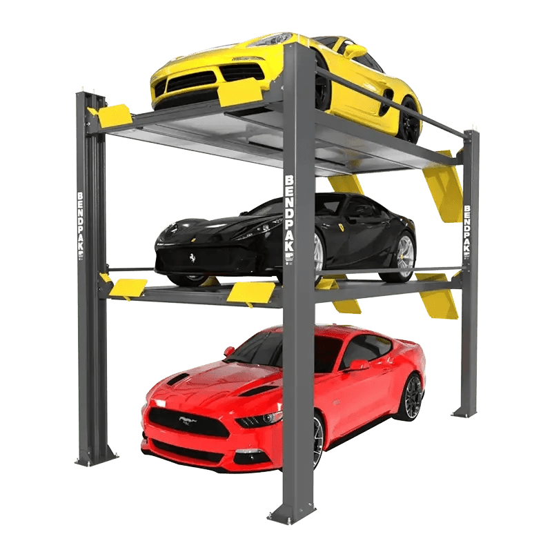 Angled front-right view of BendPak HD-973P triple-stacking four-post parking lift with yellow, black, and red sports cars on each level, showing gray steel columns and yellow safety ramps on a transparent background.