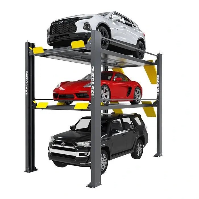 Angled front view of BendPak HD-973PX Extended Tri-Level Parking Lift with 9,000 lb and 7,000 lb capacity, showing three stacked vehicles — white SUV on top, red sports car in middle, and black SUV below — supported by gray steel columns with yellow ramps on a white background.