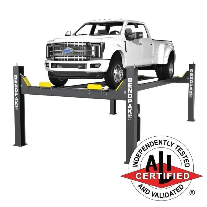 BendPak HDS-18E four post lift shown with a white pickup on the runways and ALI Certified badge, demonstrating a heavy duty 18000 lb truck lift