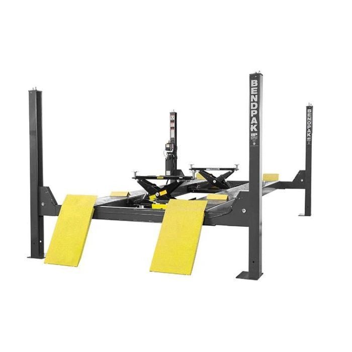 BendPak HDS-14 four-post lift with integrated bridge jacks and yellow approach ramps, rear angle view highlighting alignment-ready configuration.