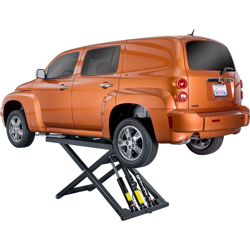 BendPak MD-6XP portable mid-rise scissor lift raising an orange SUV; compact design with dual hydraulic cylinders and black powder-coated platforms