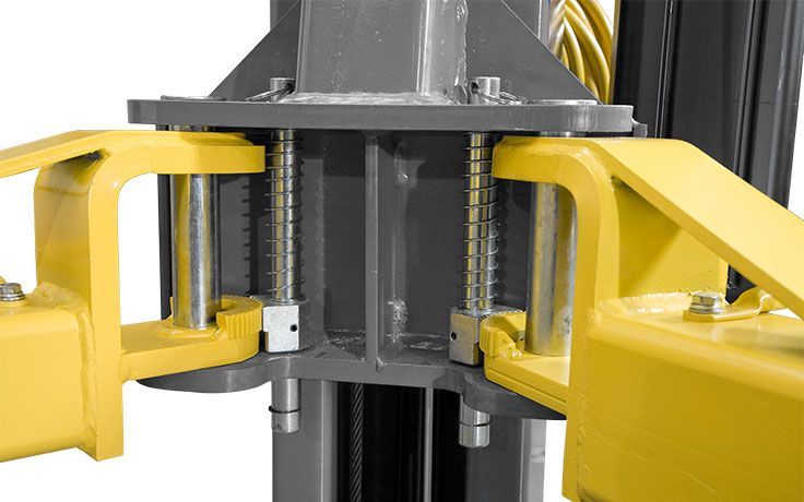 BendPak XPR-12CL-192 two-post lift arm joint close-up showing reinforced steel pivot assembly with heavy-duty bearings for smooth arm movement