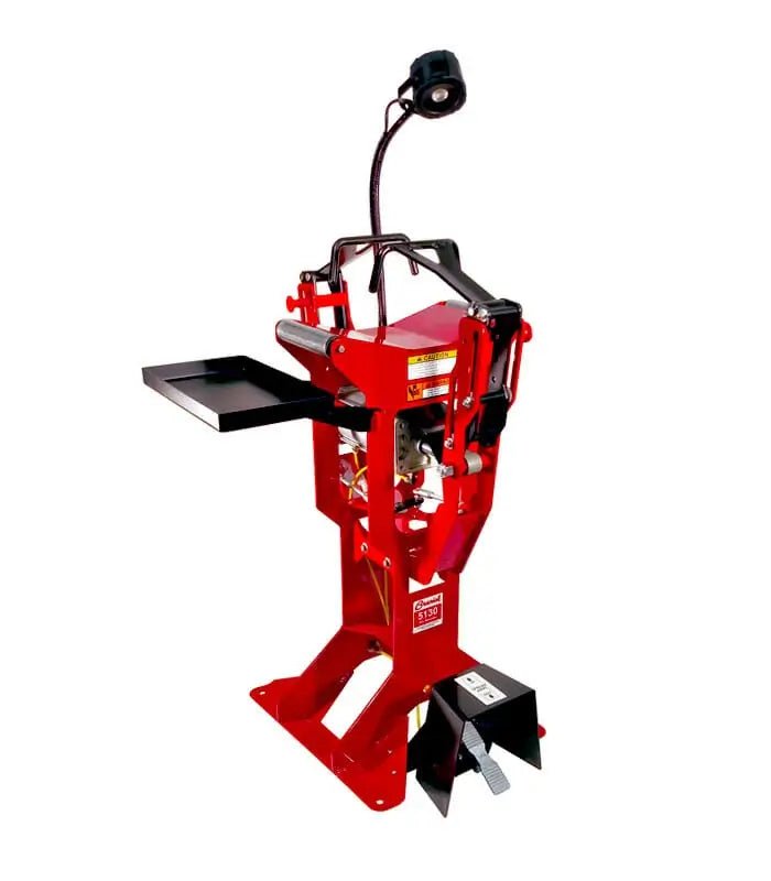 Branick 5130 tire spreader, front angled view showing red steel frame with adjustable tire platform, spreader arms, and mounted work light for efficient passenger and light truck tire service.