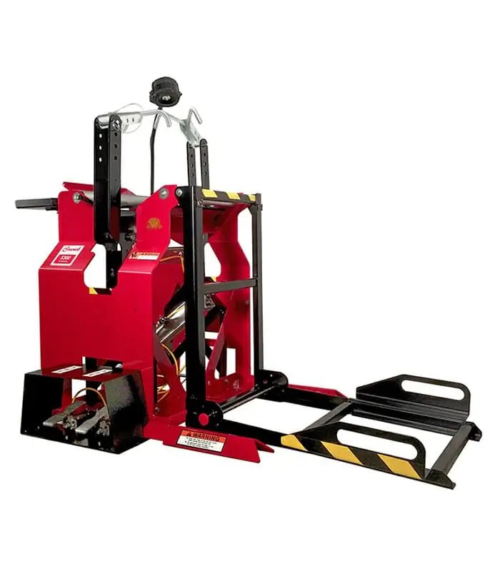 Branick 5300 tire spreader, heavy-duty super single model with red steel frame, pneumatic controls, and roll-on platform designed for large truck and OTR tire inspection and repair.