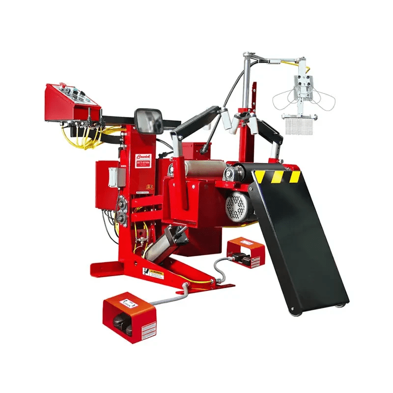 Branick 5700E tire spreader, front angled view showing red adjustable-height frame, pneumatic controls, overhead work light, and tilting platform designed for precise heavy-duty tire service.