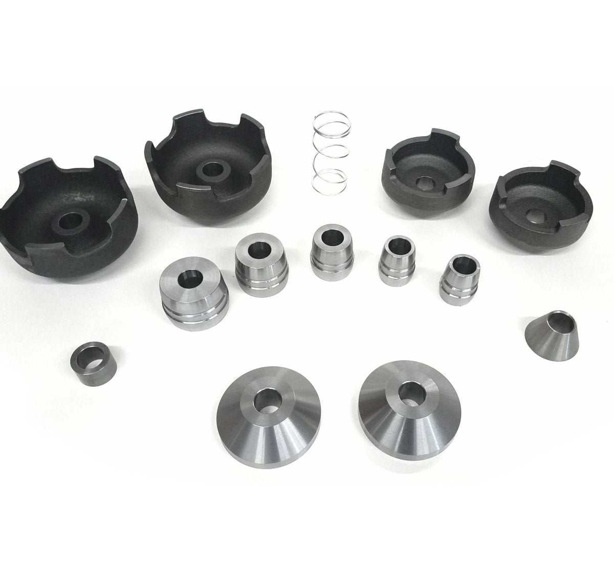 Brake lathe adapter set components for 1-inch arbors with bell clamps, double-ended adapters, cones, spacer, and spring