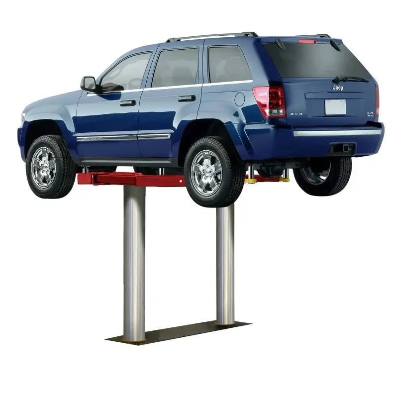 Challenger Lifts EV1220 inground lift elevating a blue Jeep SUV on twin hydraulic pistons, demonstrating clean floor design and heavy duty lifting capability