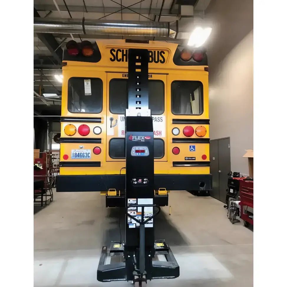 Yellow school bus on a rotary m140168yl cross beam kit for column lift setup