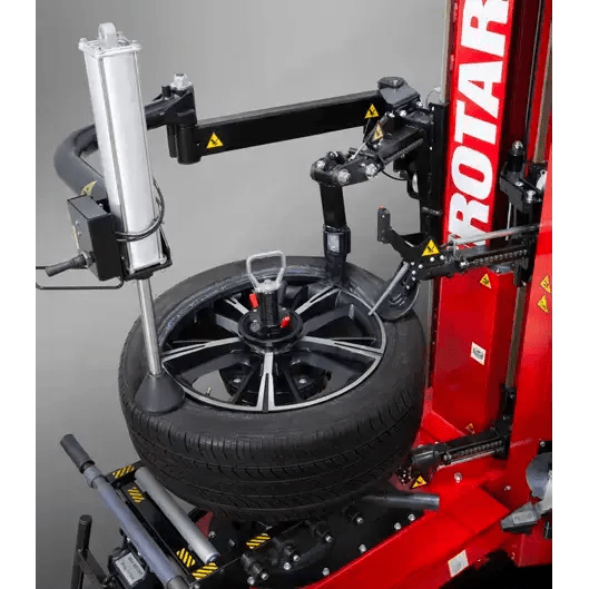 Red tire changer with wheel and tire mounted for Rotary R1250 leverless r1200 changing