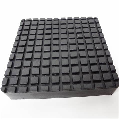 TRIUMPH 12345 black square lift pad with grid surface shown from above.