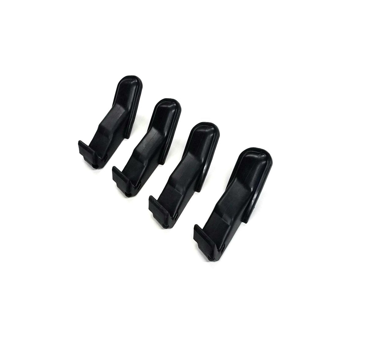 Four black jaw covers shown with their curved sides visible