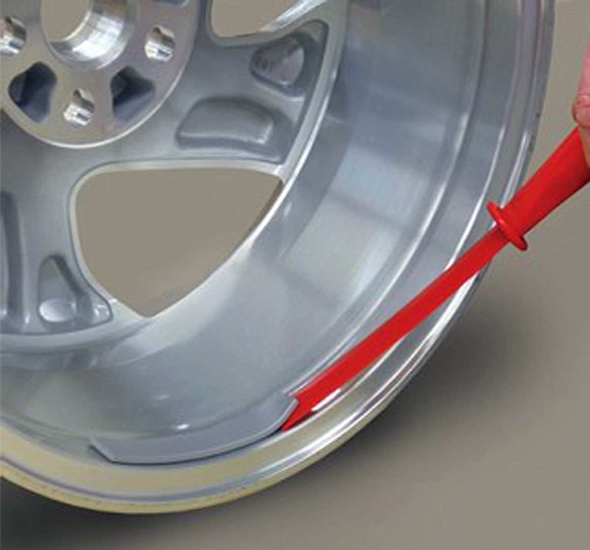 3M red plastic wheel weight removal tool with ergonomic handle and beveled edge for scratch-free adhesive weight removal