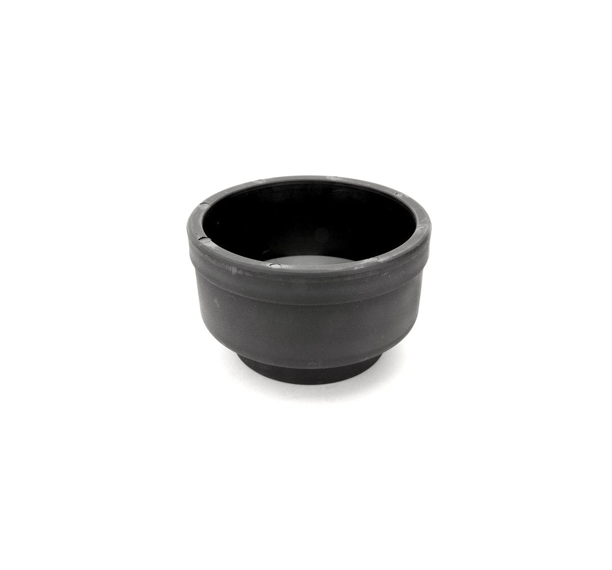 Black pressure cup with open circular top and raised rim