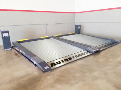 Autostacker A6W-OPT1 extra wide parking lifts side by side in a commercial garage with dual galvanized platforms