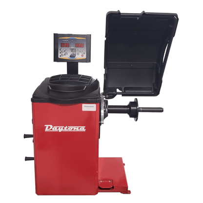 Daytona BL-956 heavy duty wheel balancer with its hood raised and digital display above the cabinet