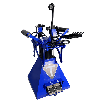 TRIUMPH TS-850 blue tire spreader angled view showing arm extensions and foot pedal.