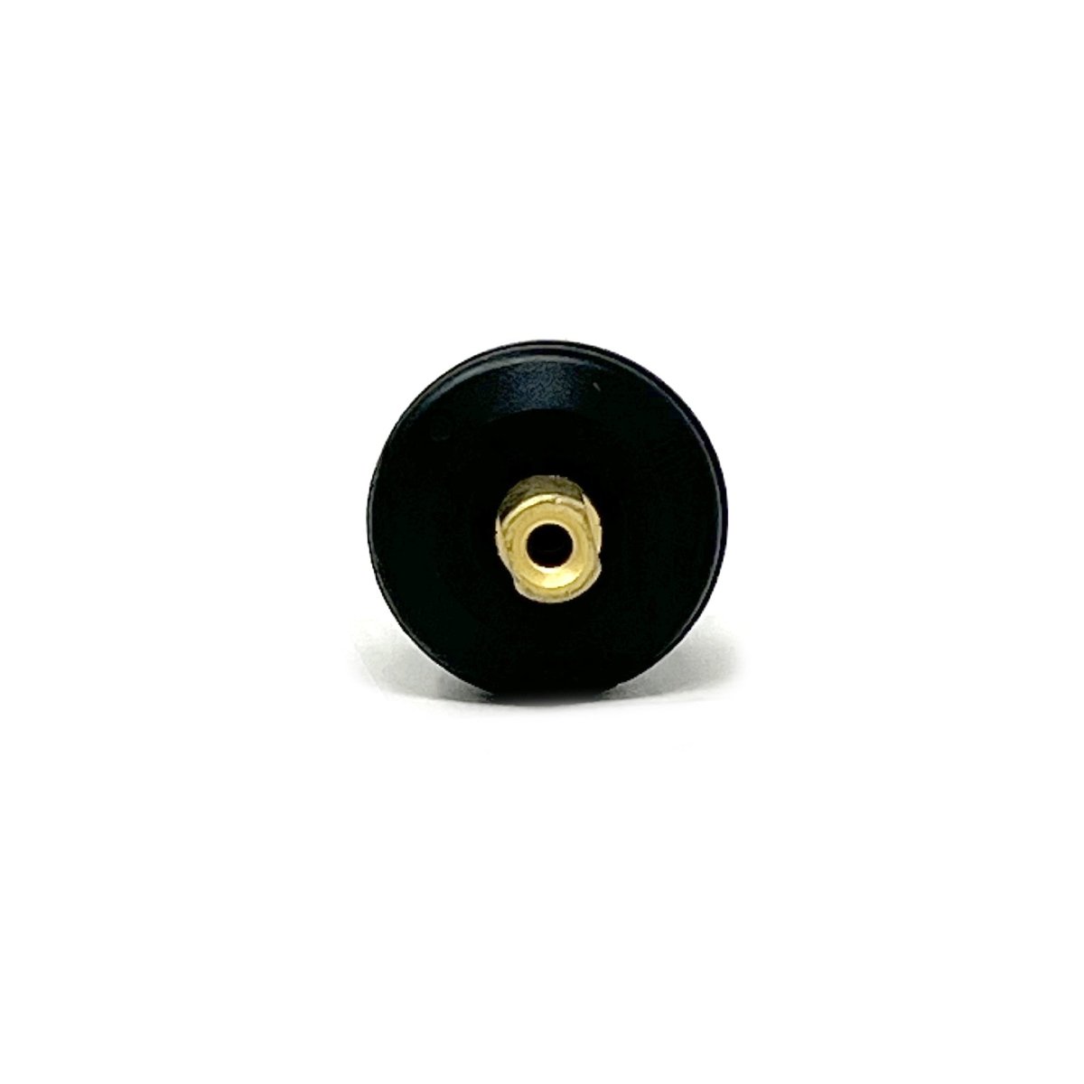 Wegmann Automotive WG-U2 TPMS valve top view showing brass opening centered in black rubber body.