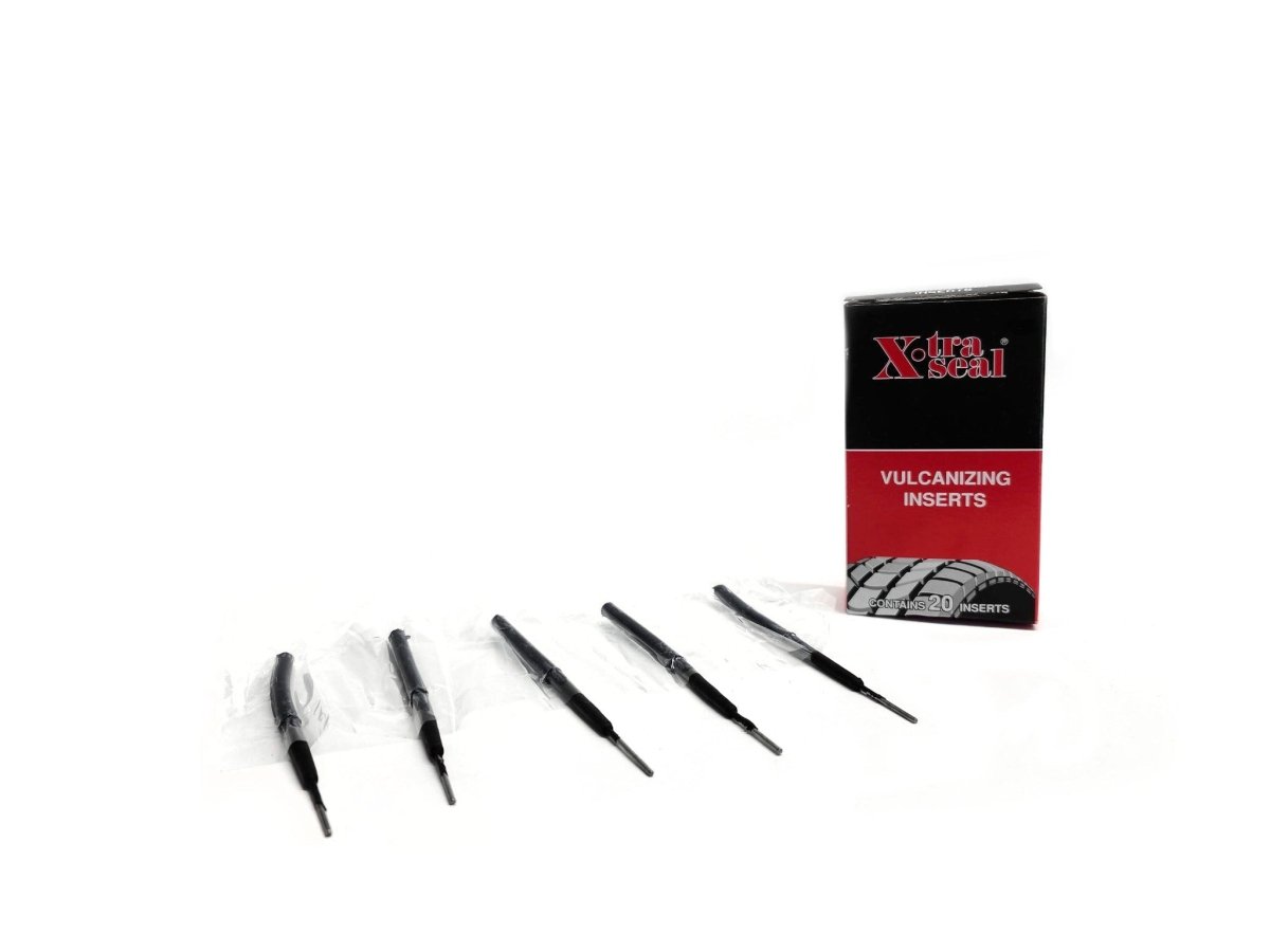 XTRA SEAL box with several 1/4-inch lead wire tire repair inserts arranged in front on white background.