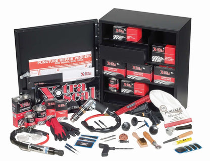 Open metal cabinet filled with Xtra Seal and tire repair essentials kit including assorted plugs, tools and supplies.