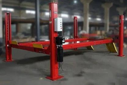 Katool KT-4H150 4 Post Alignment Lift side view showing red columns, power unit with control panel, runways and yellow ramps on a white background.