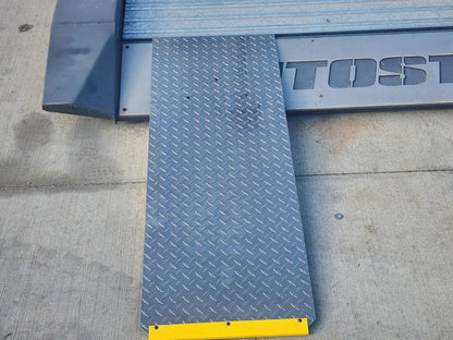 Autostacker 5174106 A6S EXT48 aluminum ramp closeup showing diamond plate surface texture and yellow edge for traction and visibility