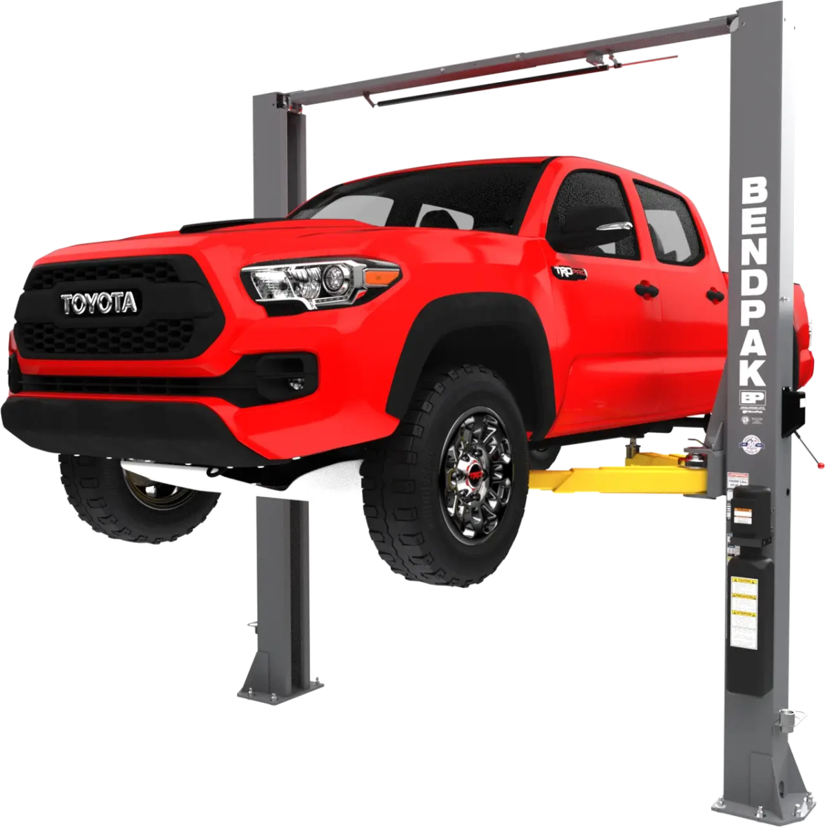BendPak 10APX two-post lift in hero view raising a red Toyota pickup, clearfloor design with overhead beam, Low-Pro arms and column power unit.
