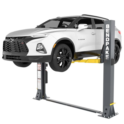 Side view of BendPak 9APF open-top two-post car lift supporting an SUV on its arms