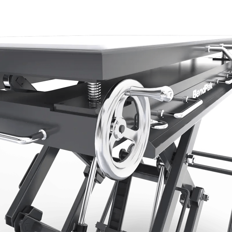 BendPak EVS4500 battery pack lift closeup showing precision screw jacks with handwheel controls for fine adjustment and secure leveling of EV battery modules.