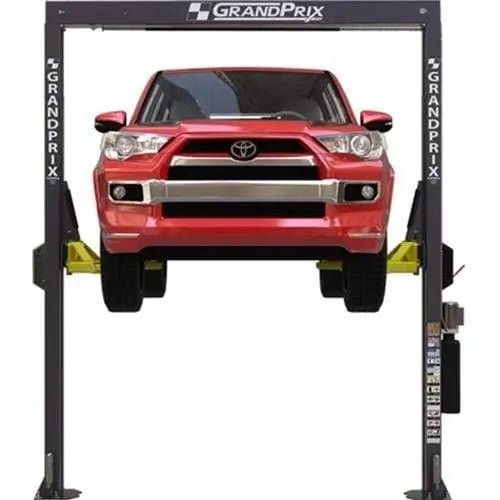 BendPak GP-7 two-post car lift raising a red Toyota SUV, front view showing GrandPrix-branded columns and yellow arms supporting the vehicle in a shop setup.