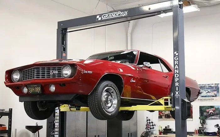 BendPak GP-7 two-post lift with classic car in professional shop