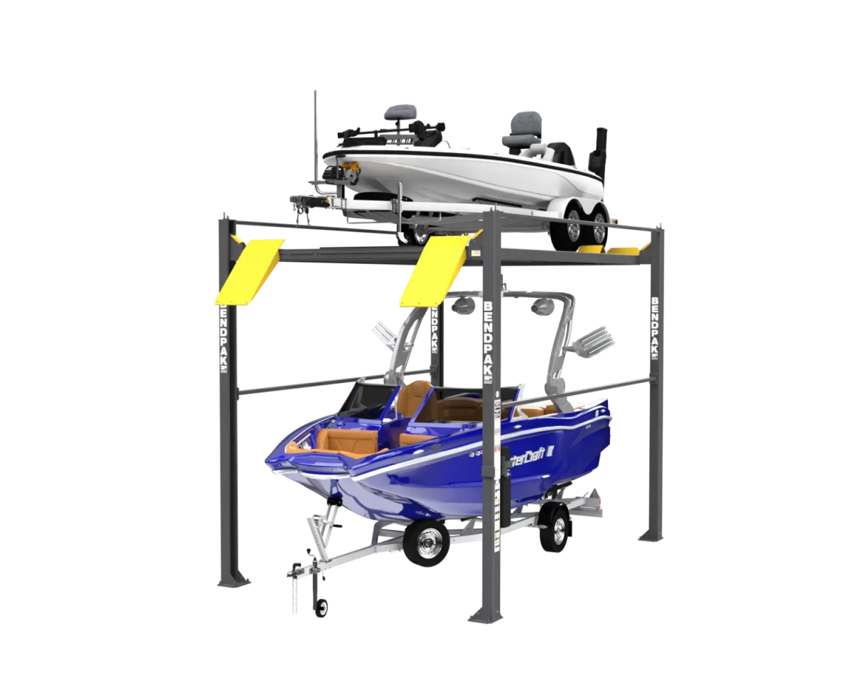 BendPak HD-7500PBX high-rise four-post boat storage lift with yellow ramps, lifting a white fishing boat on the upper platform and a blue speedboat on the lower level, designed for dual boat and trailer storage with heavy-duty steel construction and tall columns on a transparent background.
