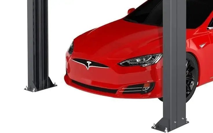 Close-up view of BendPak HD-973P commercial tri-level parking lift showing a red sedan positioned beneath sturdy gray steel columns with bolted base plates, highlighting the lift’s structural design and vehicle clearance on a white background.