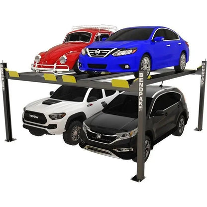 BendPak HD-9SW four-post lift studio hero view showing extra-wide dual-vehicle parking design with four columns, runways, and yellow wheel stops for multi-car storage.