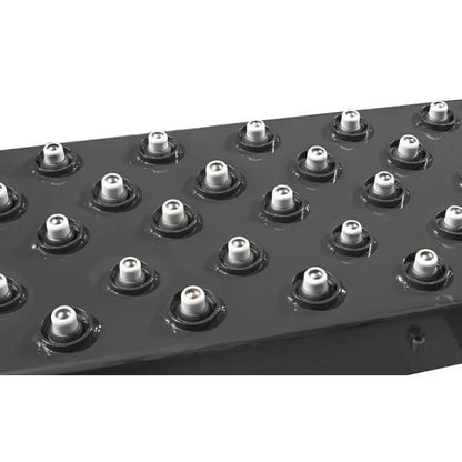 BendPak HDS-14LSX alignment lift slip plate rollers closeup, showing rows of precision roller bearings for rear wheel alignment movement.