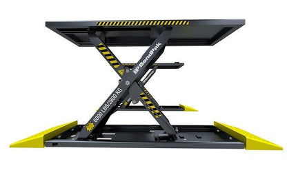 BendPak MDS-6LP mid-rise scissor lift without a vehicle; side view of extended platforms, twin scissor mechanisms, and compact low-profile base rails