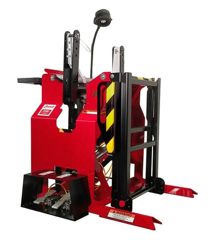 Branick 5300 tire spreader, side angled view of heavy-duty super single model featuring pneumatic arms, safety-striped guards, and overhead work light for large truck and OTR tire maintenance.