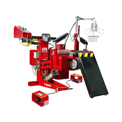 Branick 5700E tire spreader, front angled view showing red adjustable-height frame, pneumatic controls, overhead work light, and tilting platform designed for precise heavy-duty tire service.