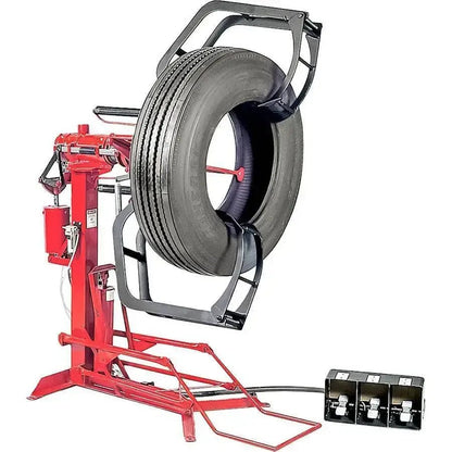 Branick 900-102 EF truck tire spreader, air-powered full circle model with red steel frame, pneumatic controls, and mounted truck tire for complete inspection and repair access.