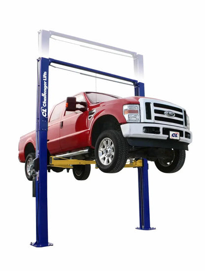 Challenger LE12 symmetric two post lift in blue raising a red Ford pickup truck, showcasing wide stance and high clearance design for full undercar access