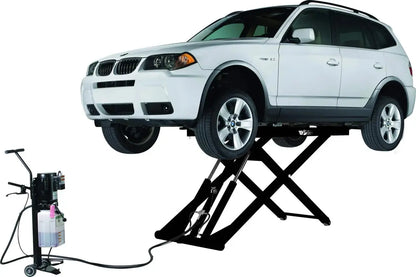 Challenger MR6 mid rise portable lift shown elevating a BMW SUV with hydraulic scissor design and mobile power unit for 6000 lb lifting capacity