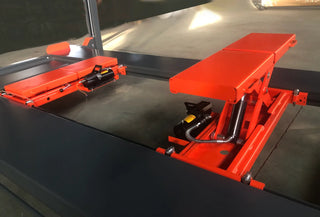 Katool KT-4H110 hydraulic scissor jack units positioned between runways for wheel-free lifting