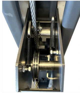 Katool KT-4H850 4 post car lift column close-up showing safety lock assembly with steel cable and return springs